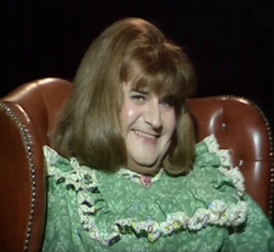 Ronnie Barker as Benny Hill in drag in 'My Secret' by Pam Ayres on The Two Ronnies.
